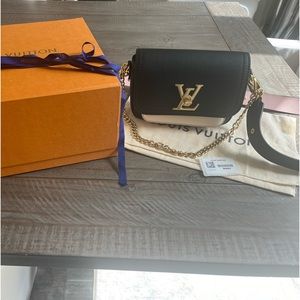 LV Lockme tender bag. Light scratches on L Box & dust bag included